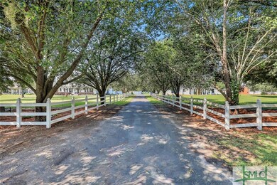 Double tree lined driveway, absolutely gorgeous in