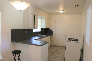 7602 Claiborne St, Houston, TX 77016 - photo 6