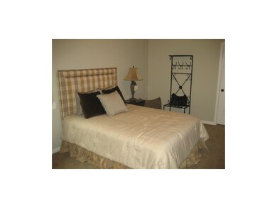 This lower level bedroom is almost as big as the m