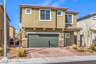 View of front of property featuring decorative dri