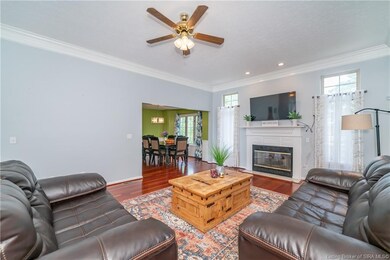 Living room with view into the dining room.