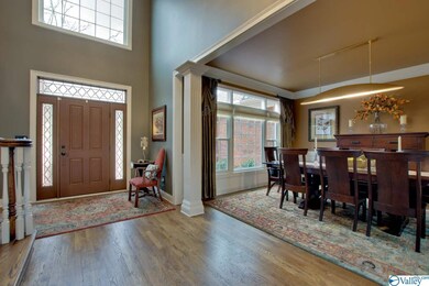 The foyer is the first impression one gets of a home and this one is elegant and inviting