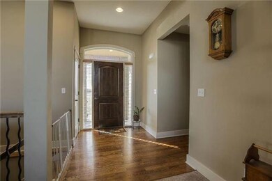 Spacious entry with beautiful hardwood floors