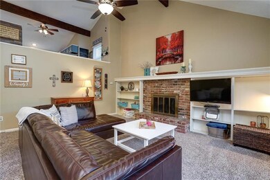 Wood beams in vaulted ceilings add great character