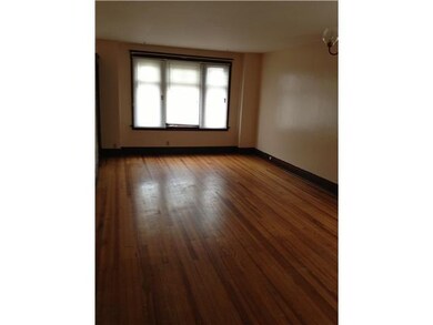 Living Room. Giant Living room with gleaming hardw