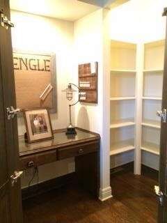 Kitchen pantry with convenient desk.
