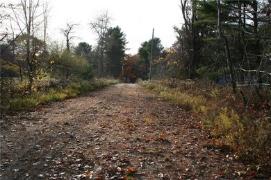 Gravel road and power lines in place.