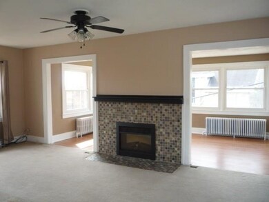 living room has electric fire place