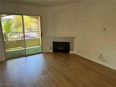 Unfurnished living room with wood finished floors