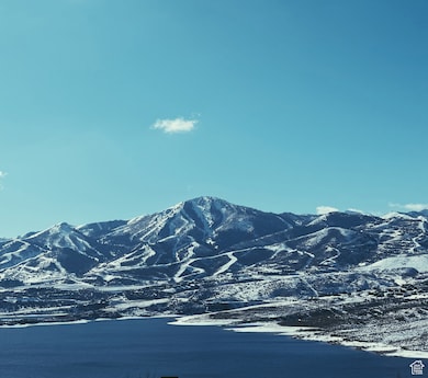 View of mountain background featuring a large body of water