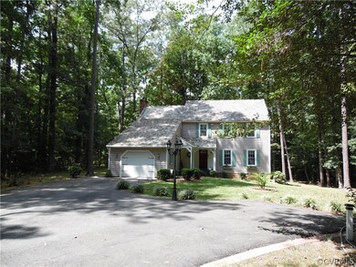 Front of Home and additional parking.