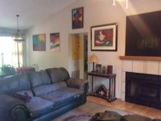 Living Room; gas log fire place - open to dining area