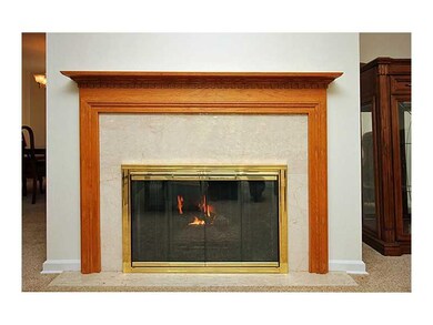 Living Room. The pretty gas fireplace provides a l