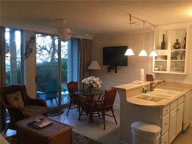 Living/dining/kitchen area with ocean view