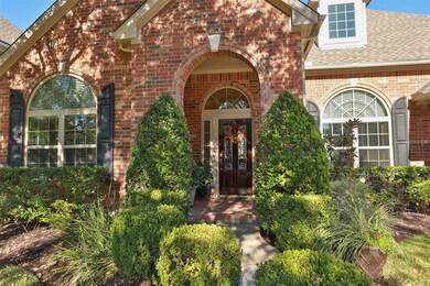 Full American brick exterior, arched entryway and