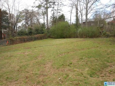 Fenced back yard for children and/or dogs.
