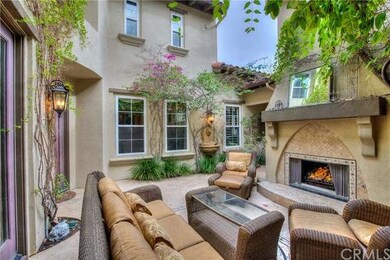 Courtyard also features fireplace, fountain and co