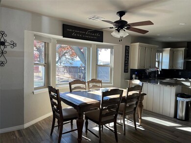 Cheerful sunlit dining area. Remote controlled bli
