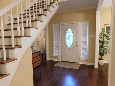 Welcoming Entry, view of the main stairway.  2nd s