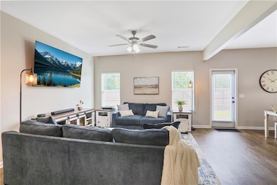 Follow the warm natural light from the foyer into 