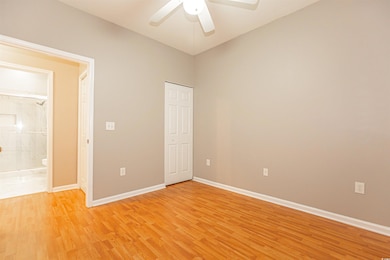 Unfurnished bedroom with light wood-style floors, 
