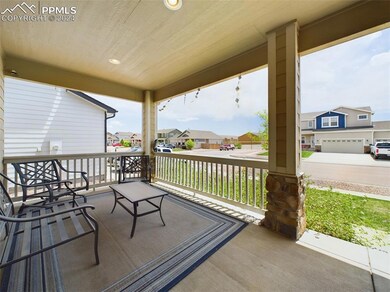 Covered front porch looking back to the street