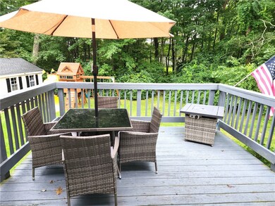 The kitchen opens onto a great deck with privacy