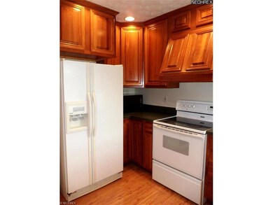 Beautiful hardwood floors and Cherry cabinates