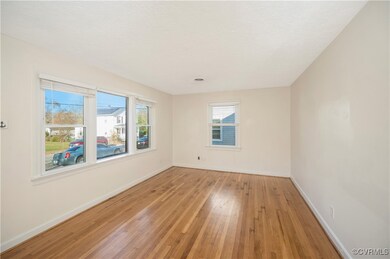 Family Room with hardwood floors.