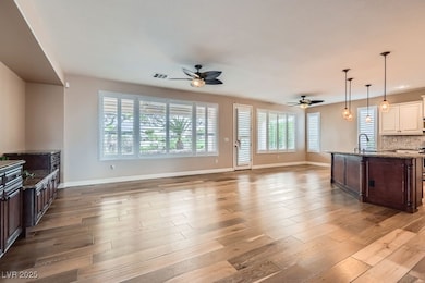Upon entering, an open floor plan is showcased by
