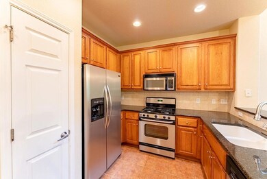 Kitchen featuring stainless steel appliances, a s