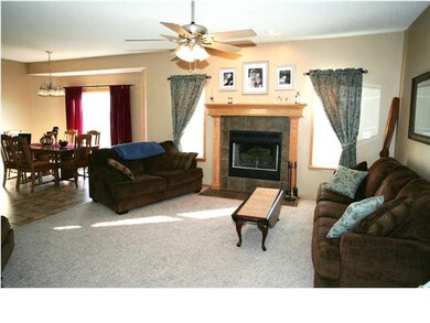 Living Room with custom fireplace and recessed lig