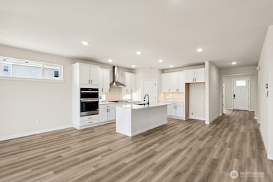 Photos are a completed home of the same floorplan.