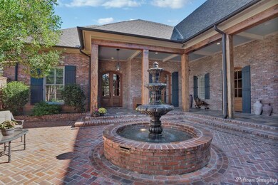 Courtyard with built in flowerbeds and fountains