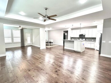 View of Living Room, Bonus Room and kitchen withou