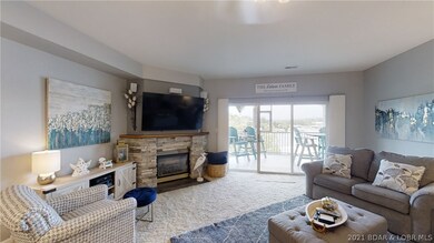 Gorgeous stone fp is the focus of the living space