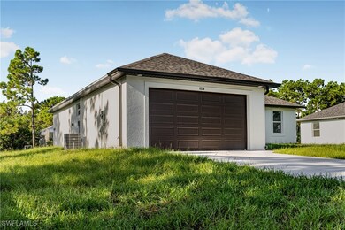1228 Nimitz Blvd, Lehigh Acres, FL 33974 - photo 4