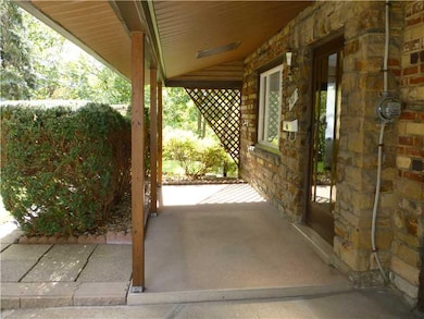 Facade/Exterior Front. COVERED FRONT PORCH