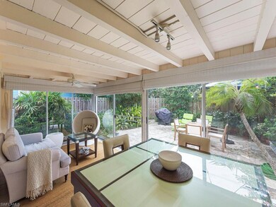 The Florida room with the dining table.