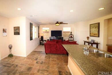 View from kitchen to dining/family room area.  Nic