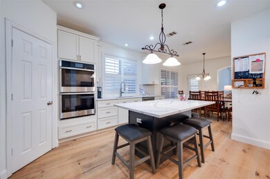 Beautifully updated kitchen with painted cabinetry