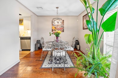 Dining area featuring hardwood / wood-style floors
