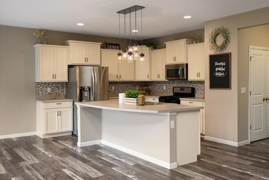 Island has room for bar stools and craft projects.