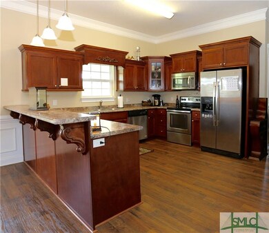 Custom cabinets and spacious breakfast bar.