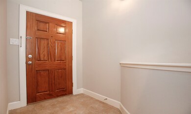 Entry with tile floors.