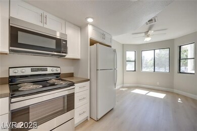 Kitchen featuring appliances with stainless steel