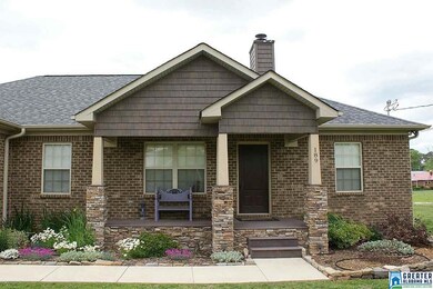 Pretty covered front porch with stone accents, ver
