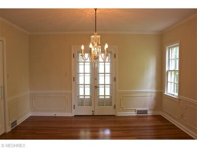 Chair rail, wood floors and wainscoting adorn the 
