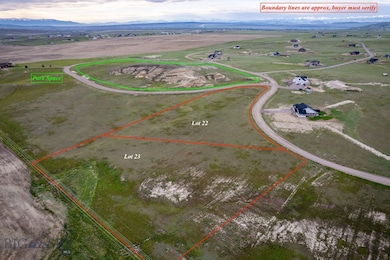 Birds eye view of property with a mountain view an