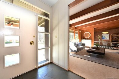 Welcoming foyer flows into the amazing living room